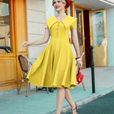 Robe vintage jaune retro années 50