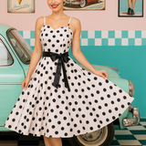 Robe vintage blanche à pois noir