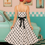 Robe vintage blanche à pois noir