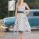 Robe vintage blanche à pois noir