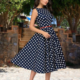 Robe vintage noire à pois blanc